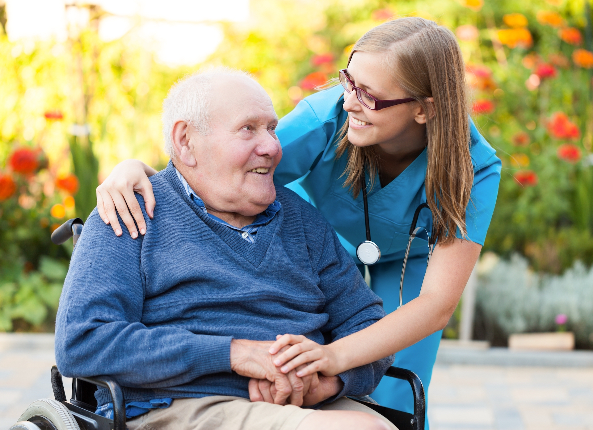 Kind,Doctor,Taking,Care,Of,An,Old,Man,In,Wheelchair.